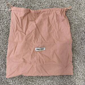 Pack of small Miu Miu, mini and Large Gucci, Extra Large Louis Vuitton dust bags